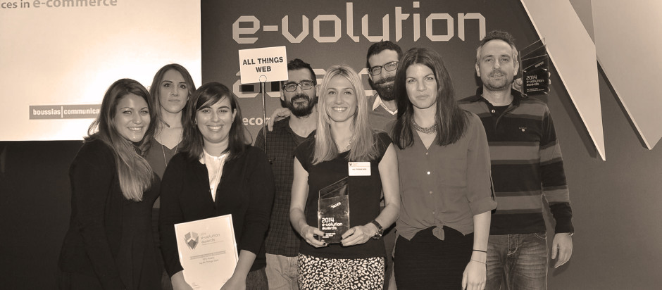 The all things web team holding awards at the e-volution Awards ceremony 2014, Athens